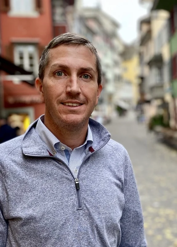 Preston Grisham on a cobblestone street in a European old town